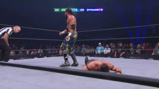 Trent tosses PAC after a swinging DDT